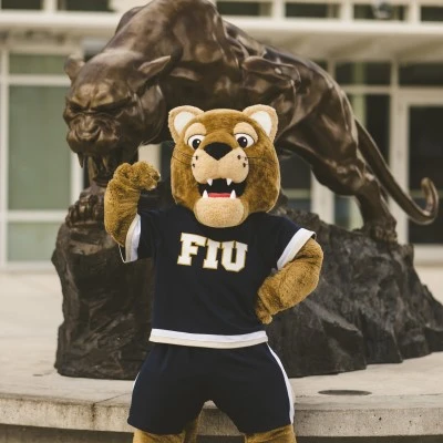 Roary posing in front of the FIU Panther statue