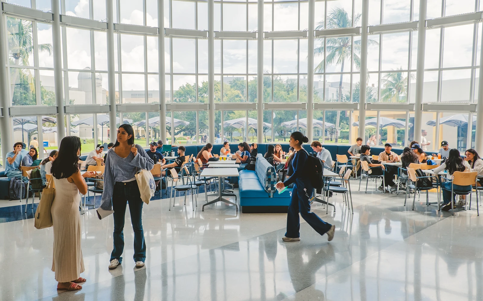 FIU Graham Center atrium with students eating lunch together